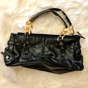 Black handbag with gold chain detail